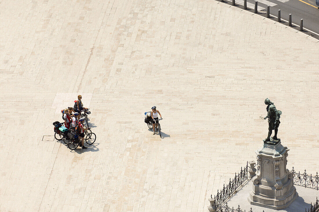 Touring cyclists at Tartini Square, Piran, Slovenia, Balkans, Europe