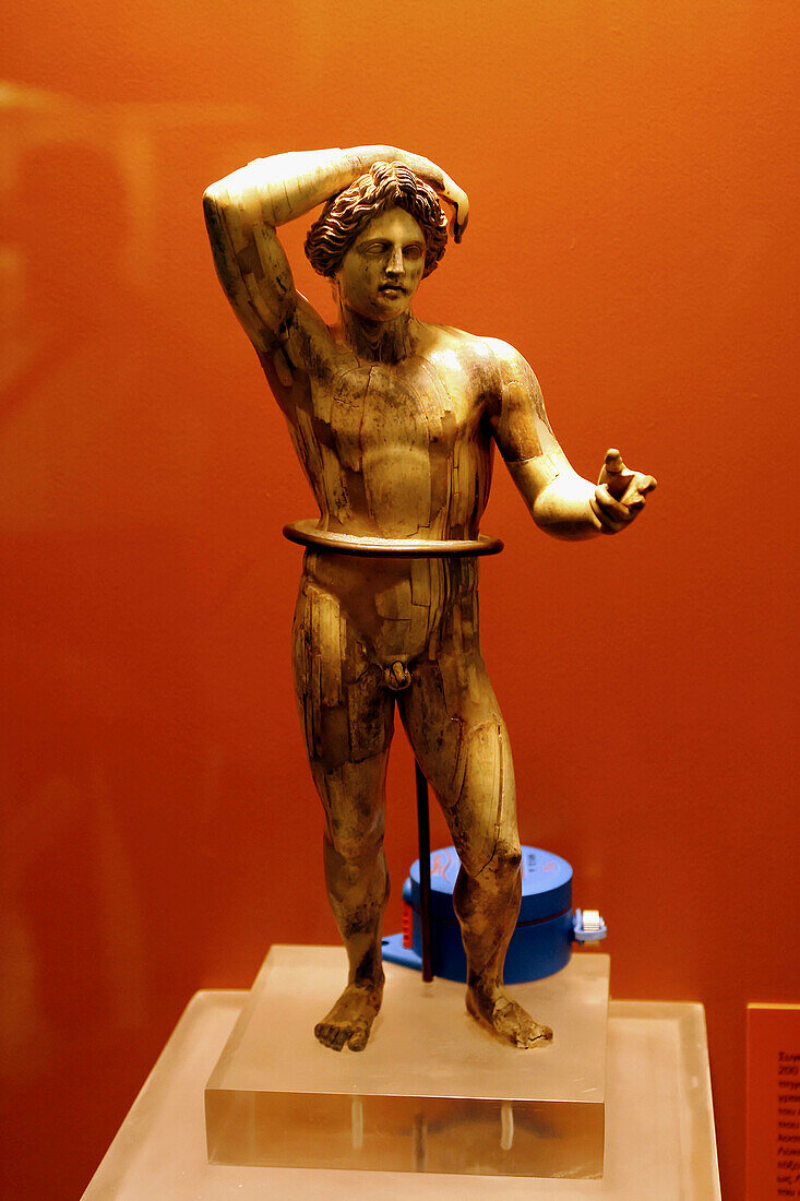 Ivory statuette of Apollo lykeios (3rd century BC) in the Ancient Agora Museum (Stoa of Attalos), Athens. Greece