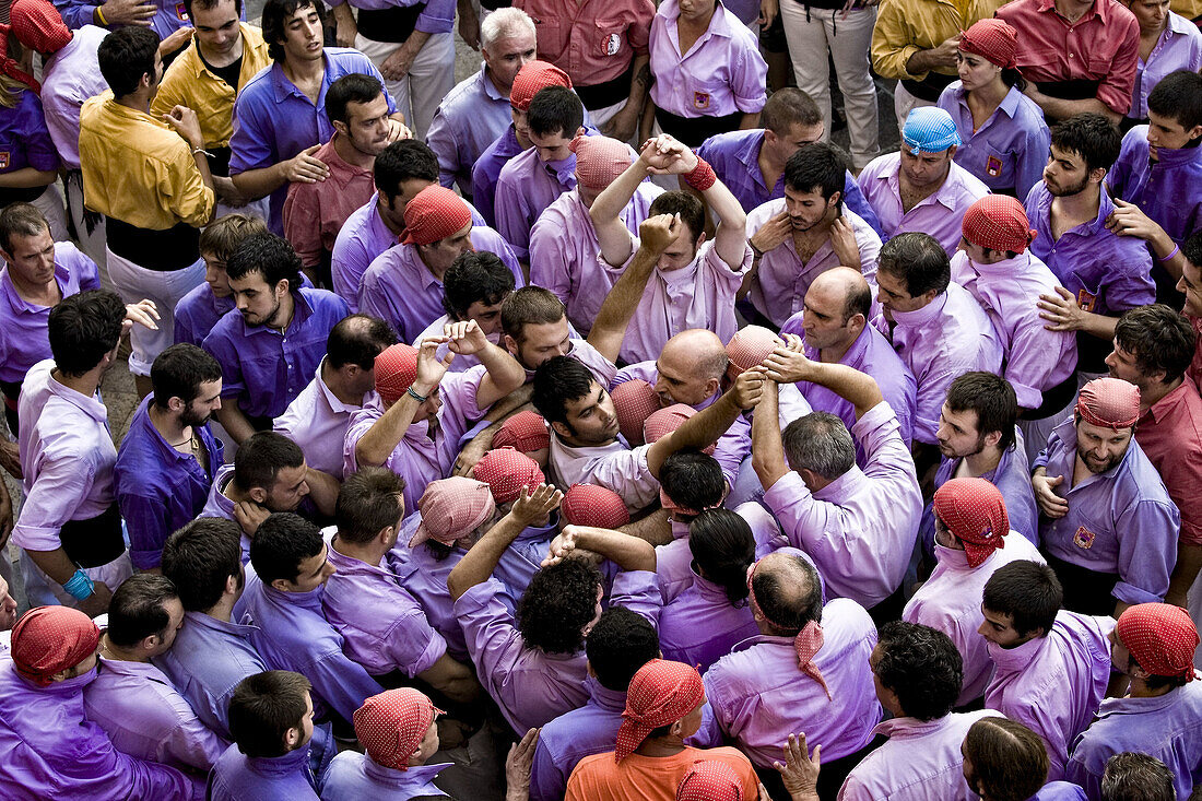 Castellers' building human towers, a Catalan tradition. Barcelona province, Catalonia, Spain
