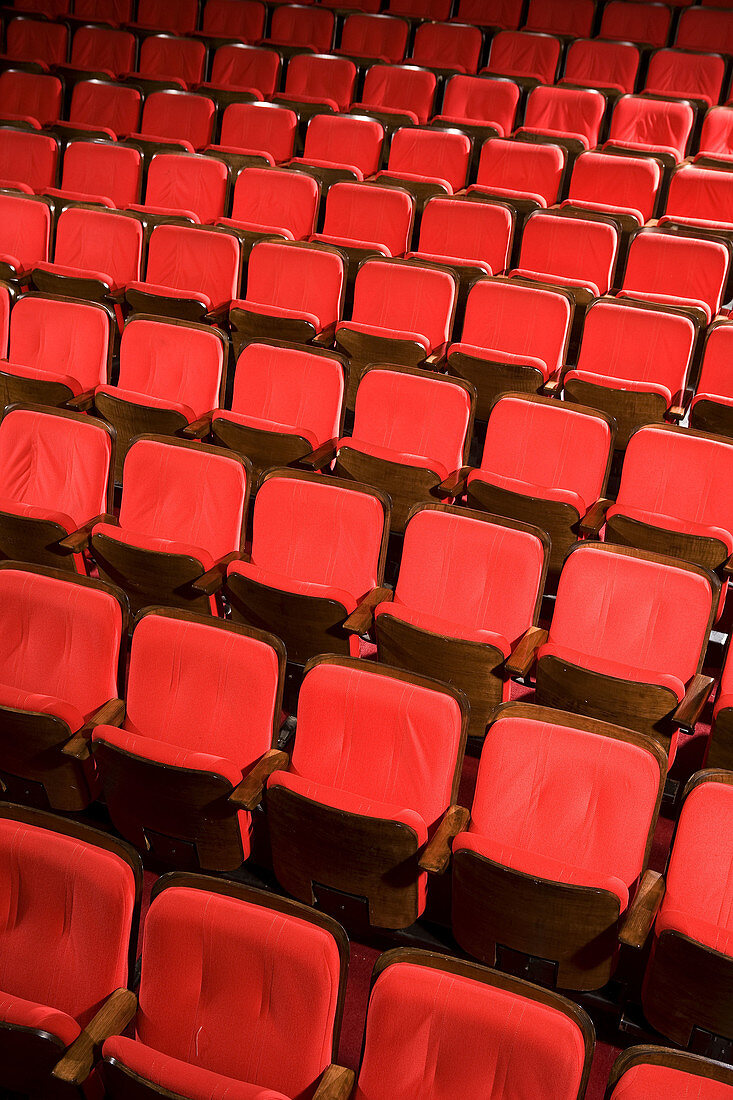 Arrangement, Auditorium, Auditoriums, Chair, Chairs, Color, Colour, Concept, Concepts, Contemporary, Deserted, Empty, Indoor, Indoors, Interior, Line, Lined up, Lined-up, Lines, Lining up, Lining-up, Many, Nobody, Order, Perspective, Red, Row, Rows, Seat,