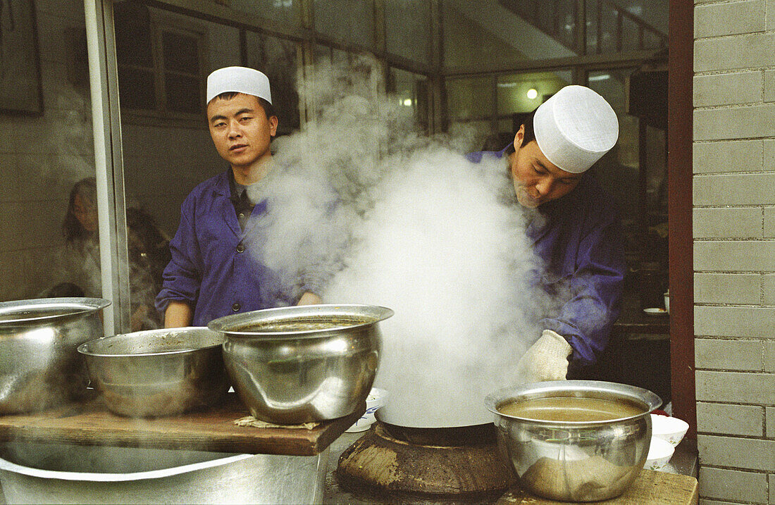 The Muslim Chefs in a local small restaurant in Xian's old muslim quarter, China