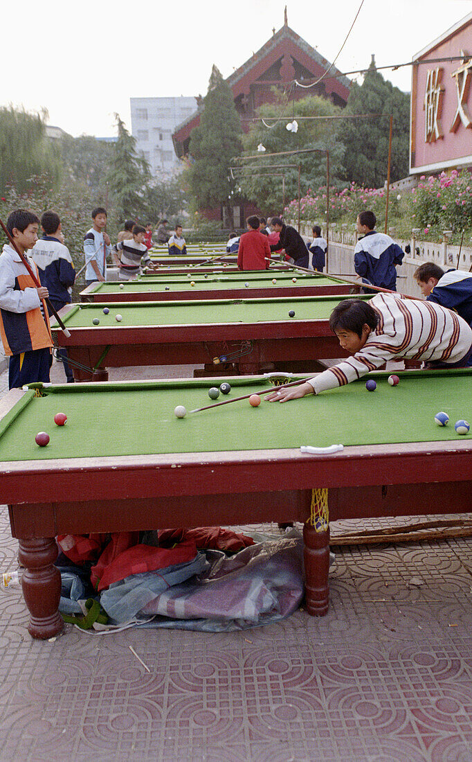 Street Billiard or pool is a very popular game in China and it is to be seen everywhere.