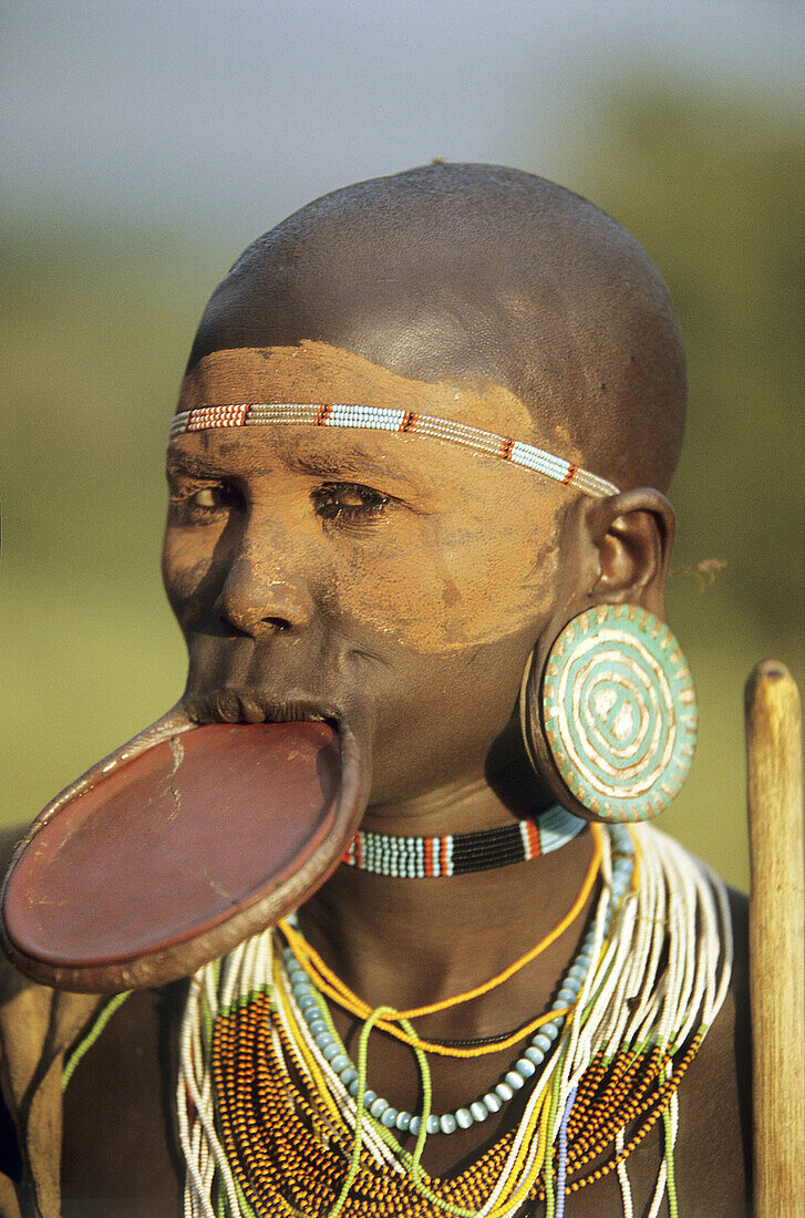 Portrait of a colorful Surma woman, Ethiopia