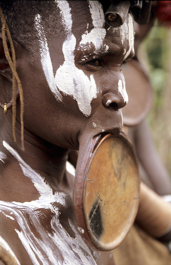 Portrait of a Surma woman wearing her clay plate in her lower lip, Sudan