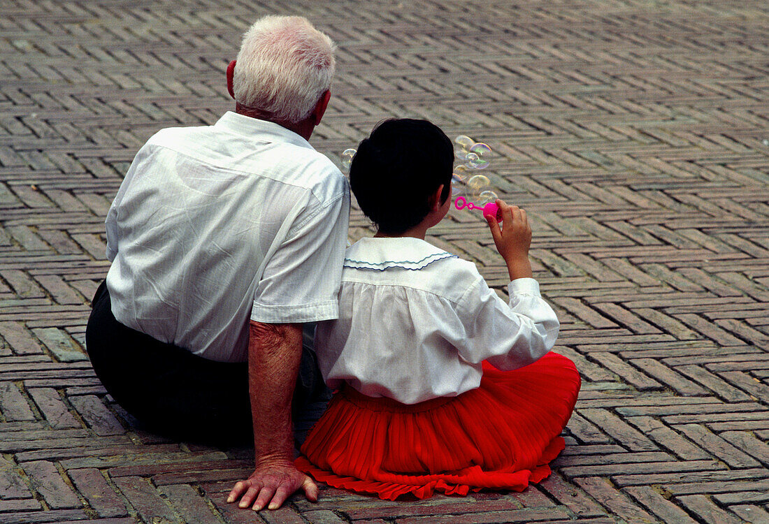 Italy, Grandfather with Granddaughter
