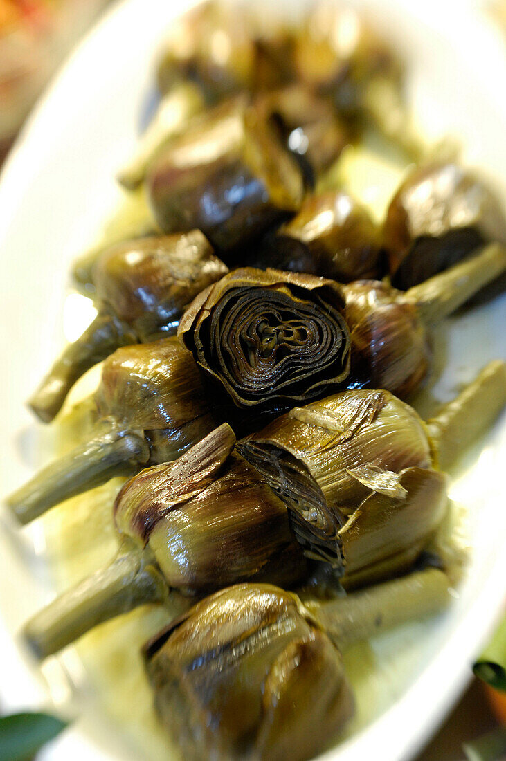 Artichokes, bowl with starters at the Restaurant Da Cesare, Bozen, South Tyrol, Italy, Europe