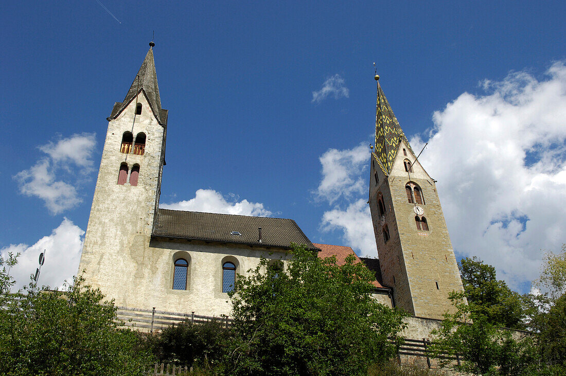 Two steeples under blue sky, Villanders, Valle Isarco, South Tyrol, Italy, Europe