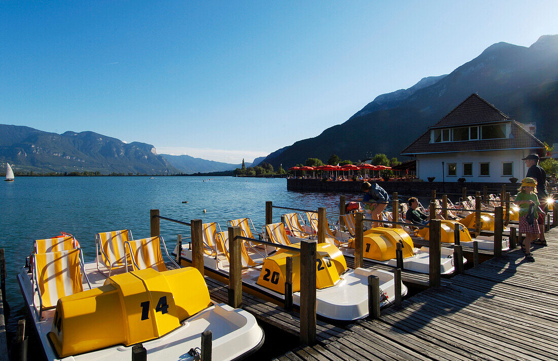 Pedal boats on Lake Kaltern, Kaltern, Bolzano, South Tyrol, Italy