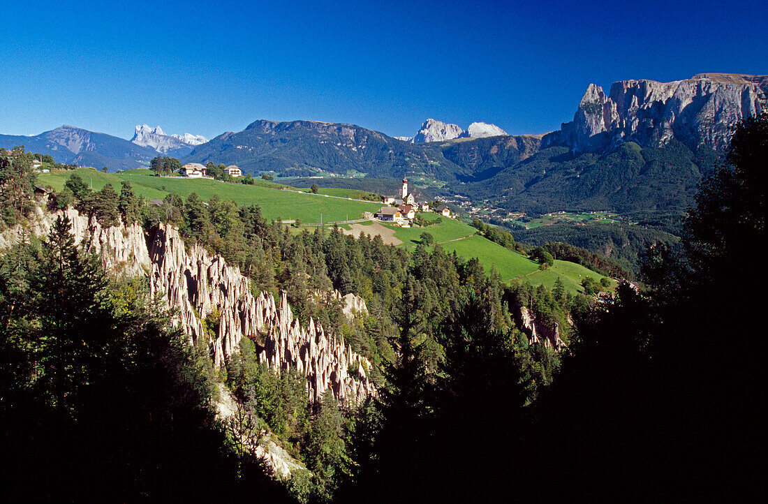 Earth pyramids at Renon, Ritten, view to Monte Sciliar, Dolomite Alps, South Tyrol, Italy