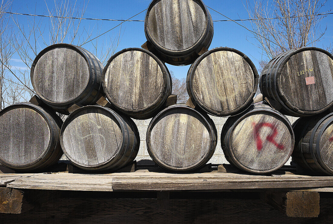 A stack of barrels on a flat bed truck in New Mexico