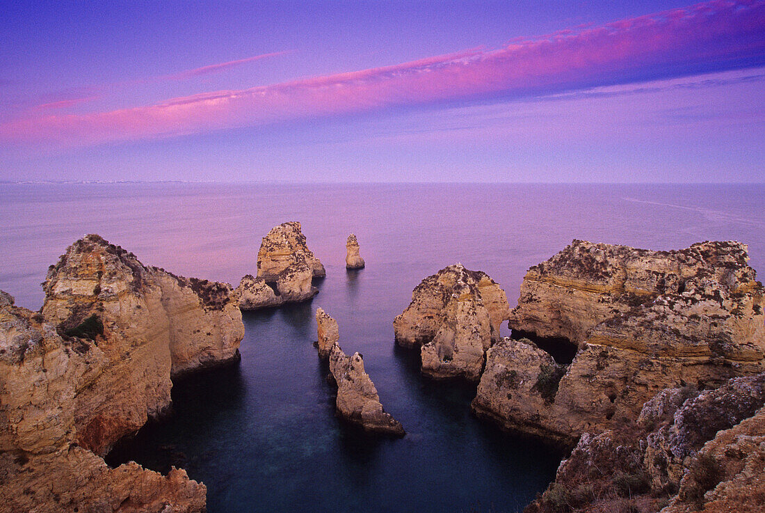 Rocky coast Ponta de Piedade in the evening, Algarve, Portugal, Europe
