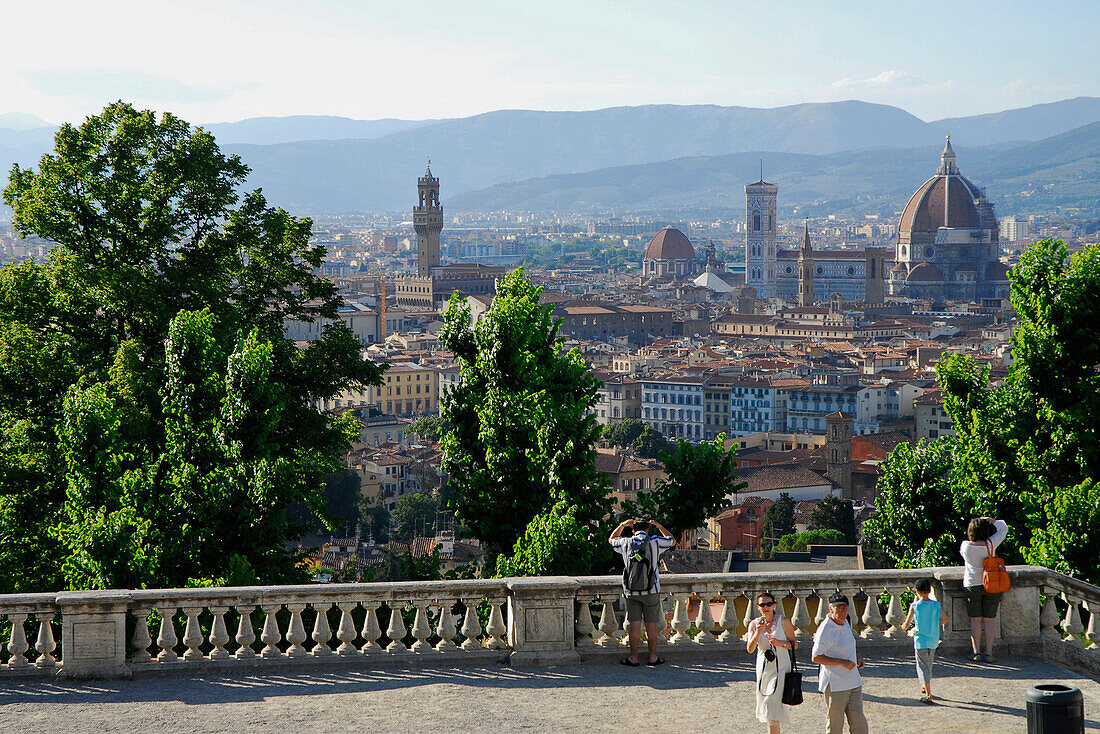 Tourists on the terrace of San Miniato al Monte, view over Florence, Florence, Tuscany, Italy, Europe
