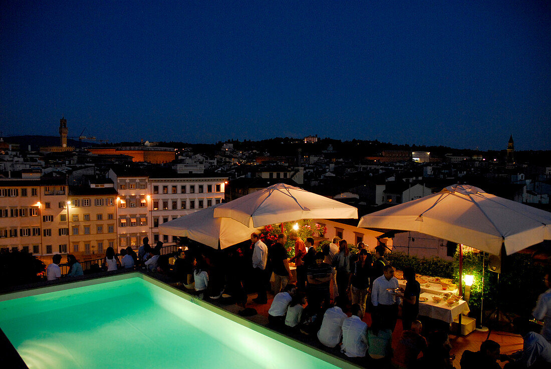 People at the roof deck of Grand Hotel Minerva with view over the city, Florence, Tuscany, Italy, Europe