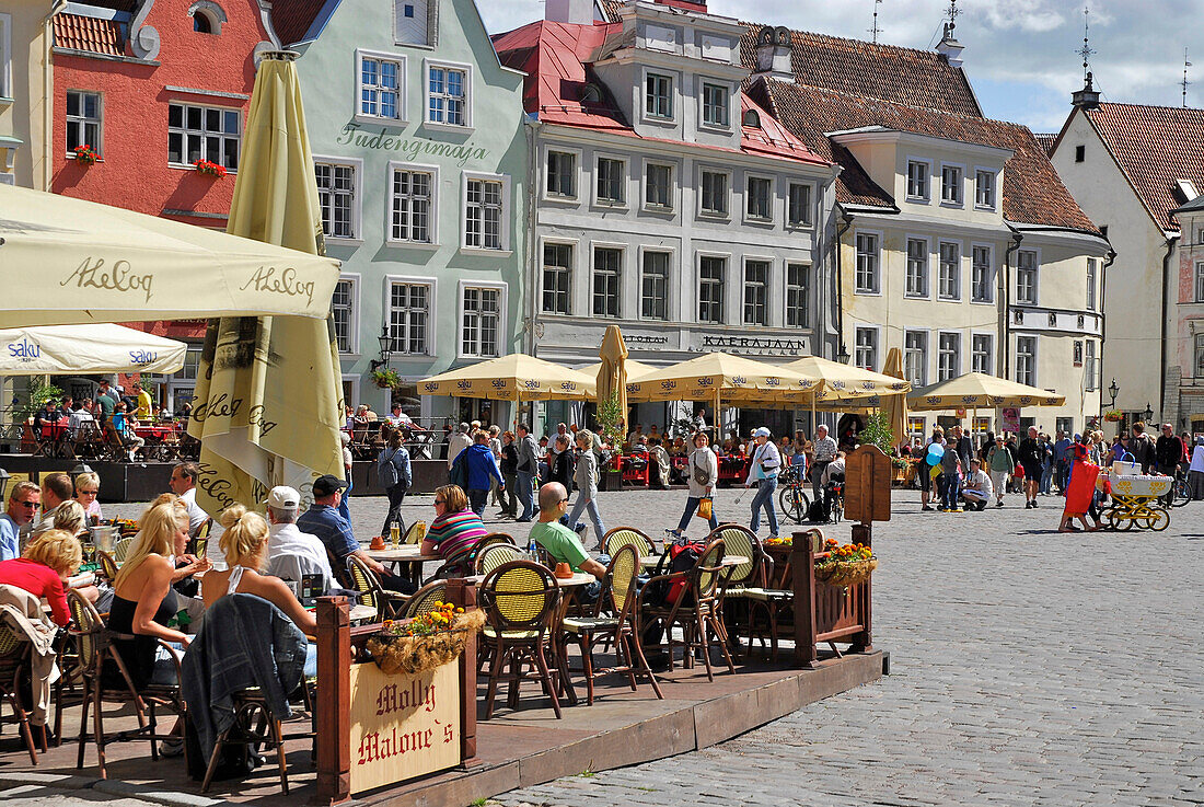 People sitting in a cafe at Raekoja Plats, town hall square, Tallinn, Estonia