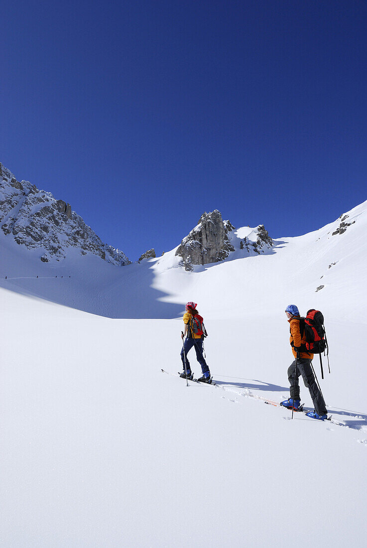 Two backcountry skiers ascending, Tajatoerl, Mieminger range, Tyrol, Austria