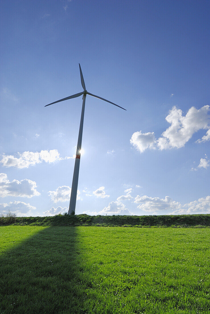 Wind turbine in backlight, Bavaria, Germany