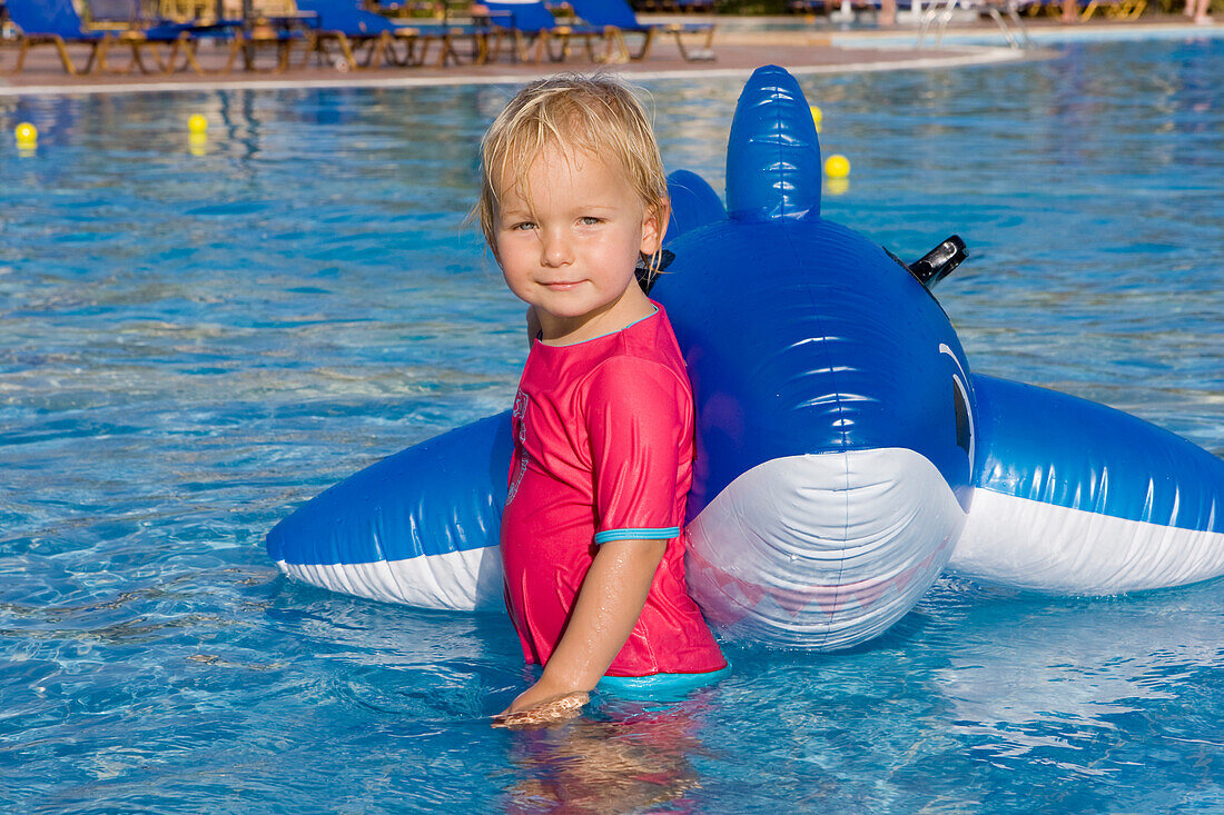 A little child, girl in the childrens swimming pool, Lamaya Resort, Coraya, Marsa Alam, Red Sea, Egypt