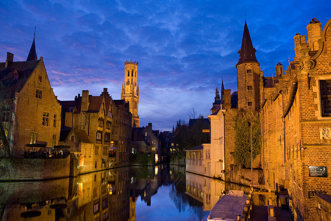 Huidenvettersplein and reflection in the canal, Bruges, Belgium