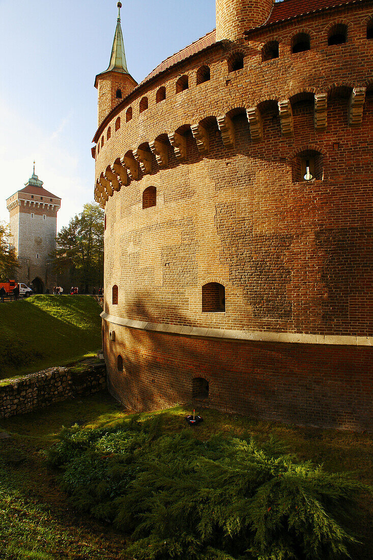 Medieval barbican and St Florian Gate in background, Krakow, Poland