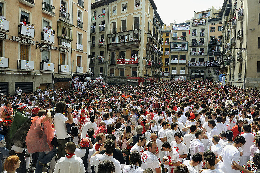 People waiting for chupinazo, the opening ceremony of the San Fermin Festival, Pamplona. Navarra, Spain