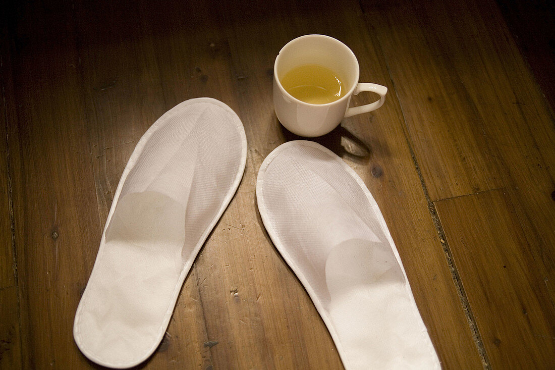 Cup of tea and slippers, China