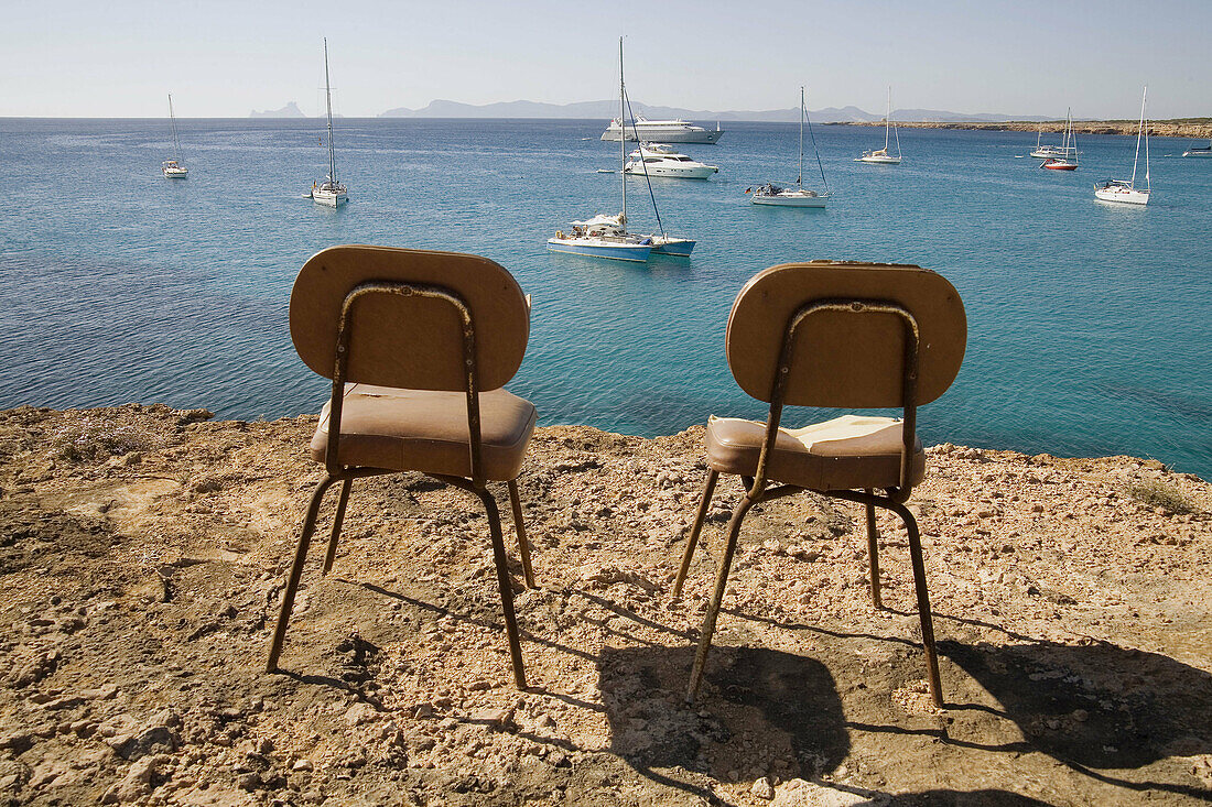 Chairs at Cala Saona, Formentera. Balearic Islands, Spain