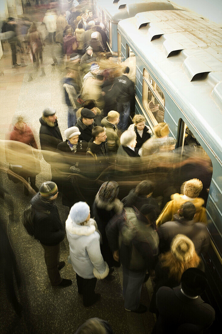 Car, Cars, Cities, City, Color, Colour, Europe, Human, Locations, Long, Moscow, Passenger, Passengers, People, Person, Persons, Perspective, Platform, Platforms, Public, Russia, Station, Stations, Stopped, Subway, Transport, Transportation, Travel, Travel