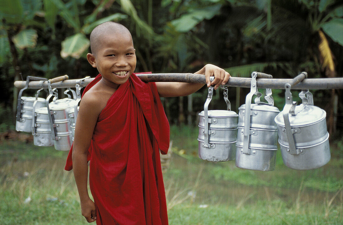 Buddhist novice collecting alms, taungoo region
