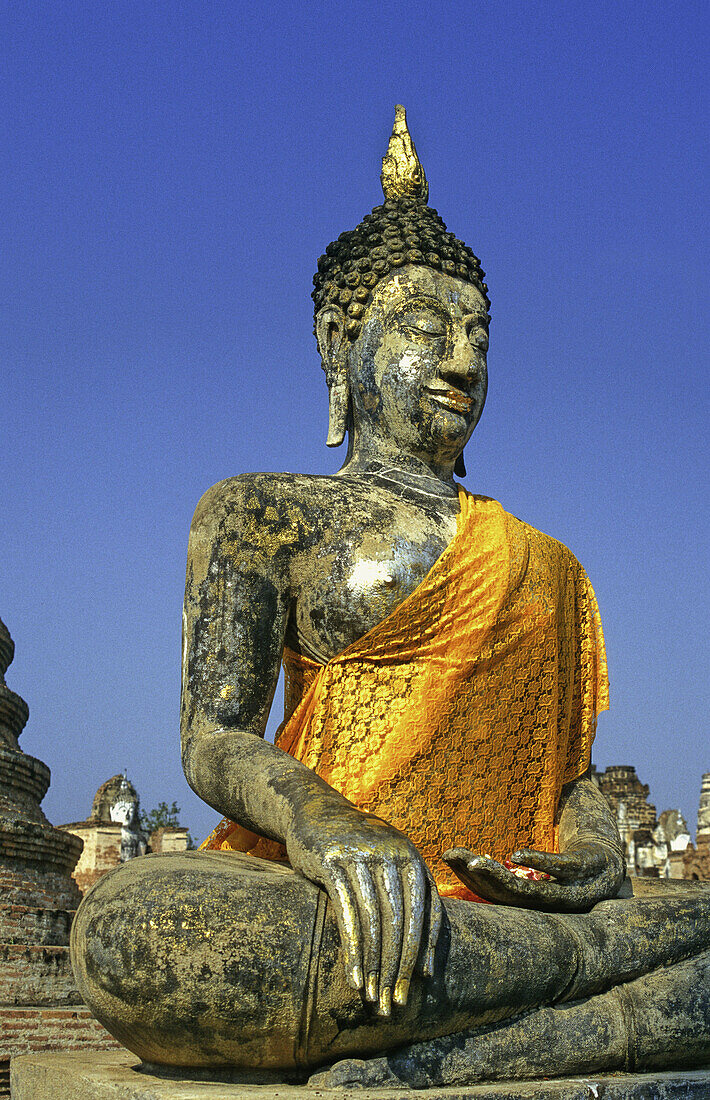 Thailand, Sukhothai, statue of sitting Buddha with sash