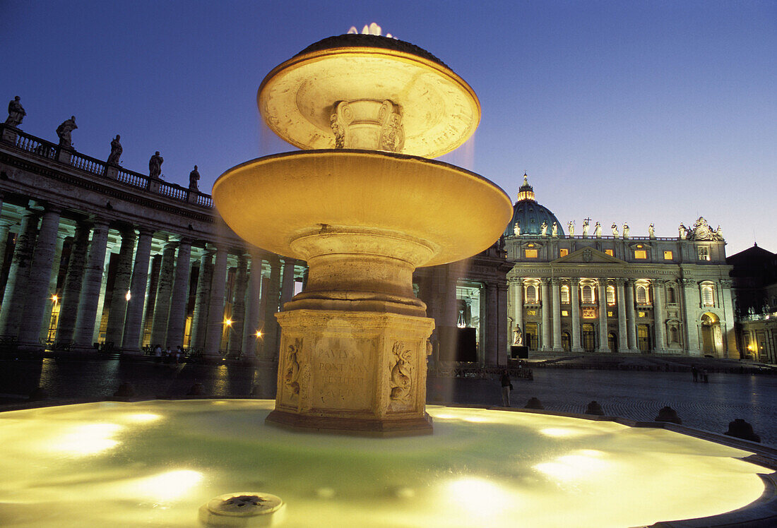 Fountain in St. Peter's Square at dusk, Vatican City, Rome, Lazio, Italy