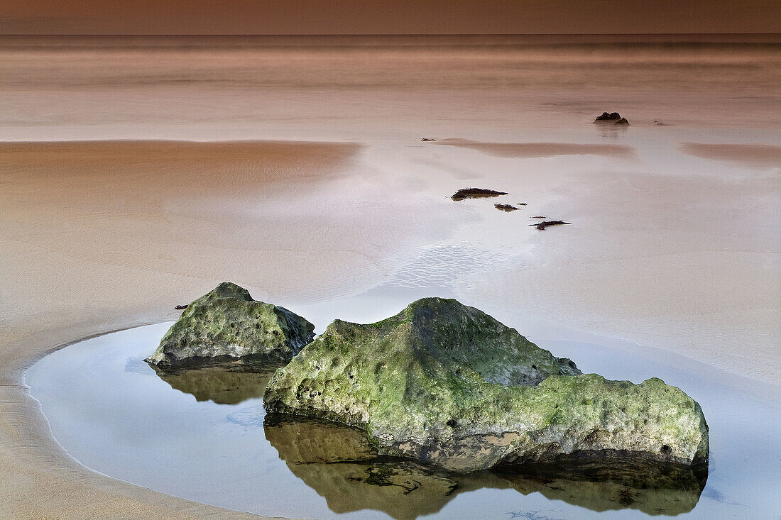 Beach with a tide pool, Berria beach, Cantabria, Spain