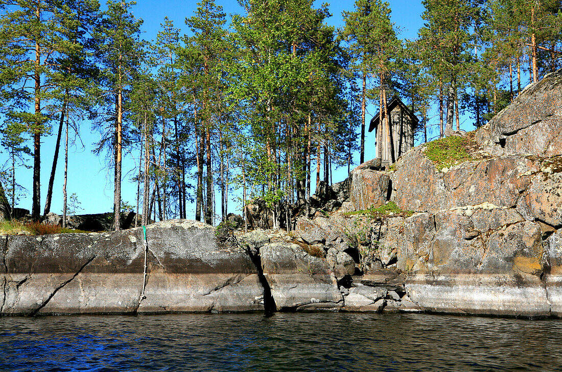 Private Insel auf dem Saimaa See im Sonnenlicht, Saimaa Seenplatte, Finnland, Europa
