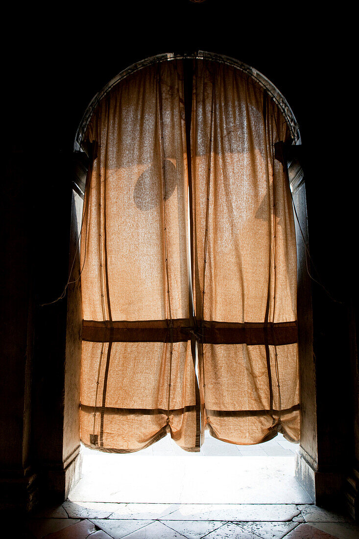 Curtain as sunblind at the door of a building, Saint Mark's Square, Venice, Italy, Europe