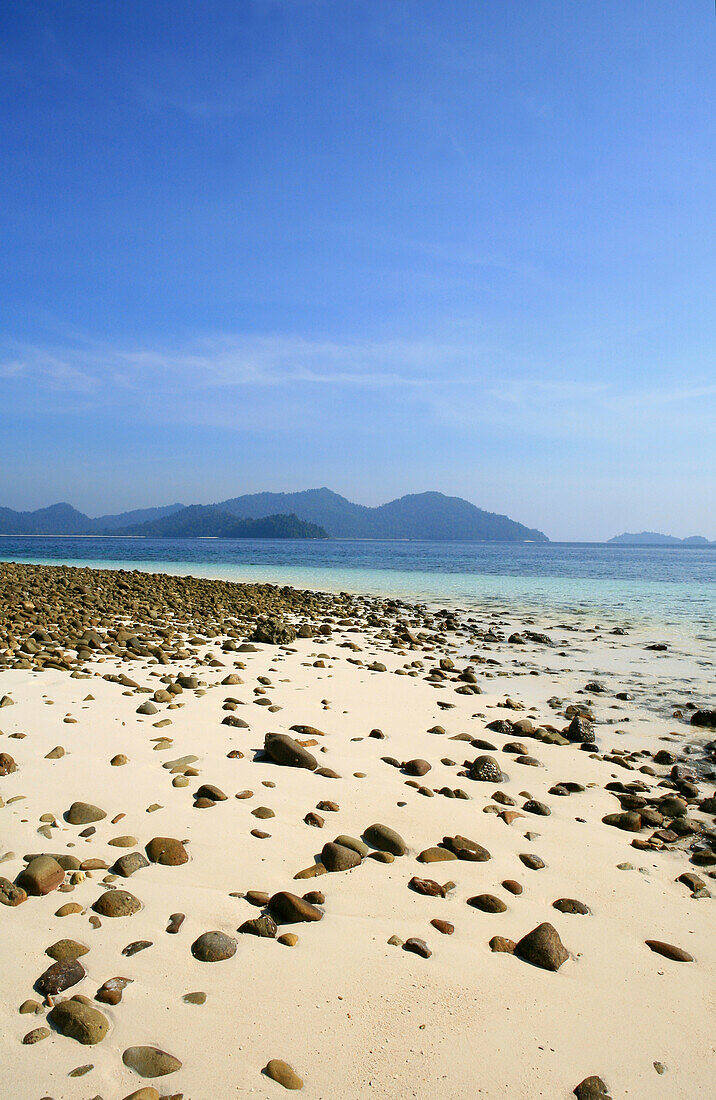 Beach on uninhabited island in the sunlight, Mergui Archipelago, Andaman Sea, Myanmar, Burma, Asia