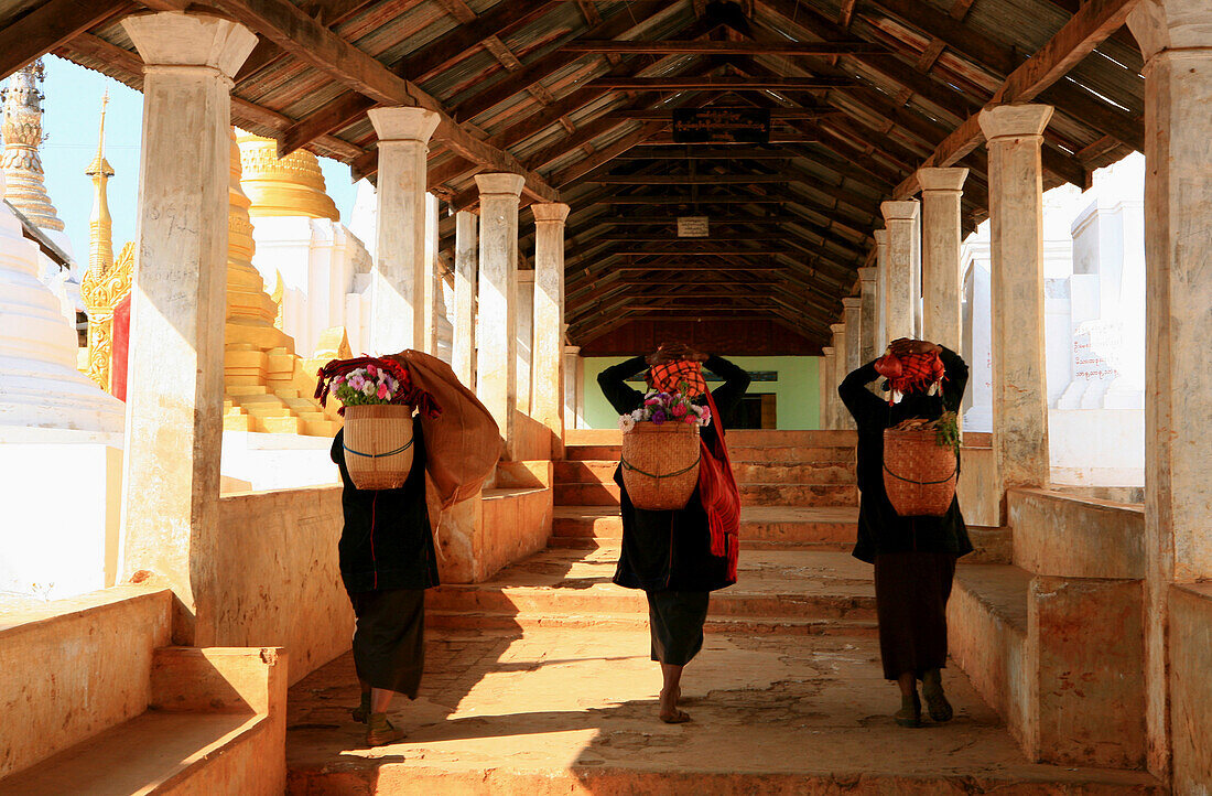 Pa-O women on stairs to the Taung Tho Kyaung Pagoda, Shan State, Myanmar, Burma, Asia