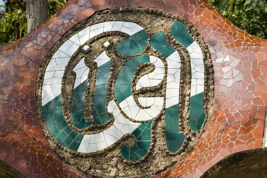 Detail of Güell name mosaics at Güell Park by Antoni Gaudí  Barcelona  Catalonia, Spain