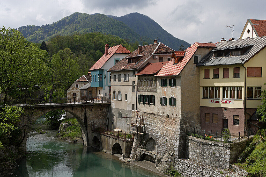 Skofja Loka, old town houses, Capuchin Bridge, Selscica river, Slovenia