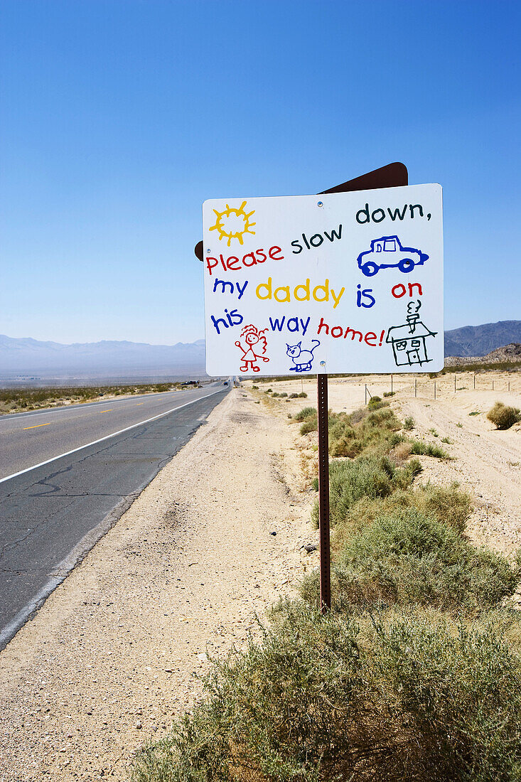 Road sign on highway near Fort Irwin, California, USA
