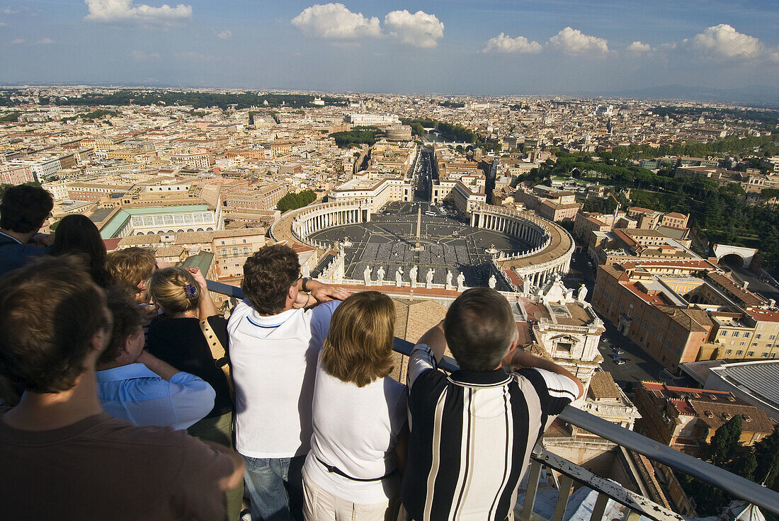 Tourists overlooking Saint Peters Square and the city of Rome from Saint Peters Basilica Dome  The Vatican, Rome, Lazio, Italy