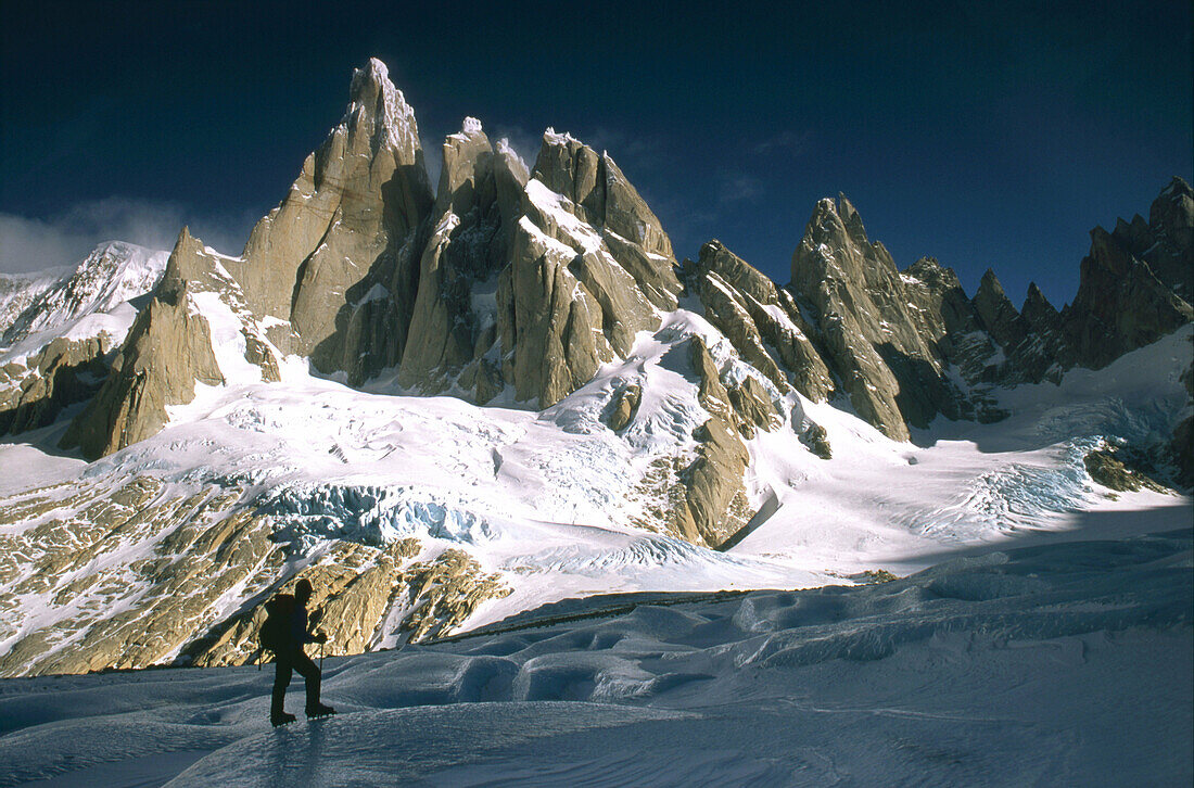 Climber on Torre Glacier under east face of Cerro Torre Los Glaciares National Park Patagonia