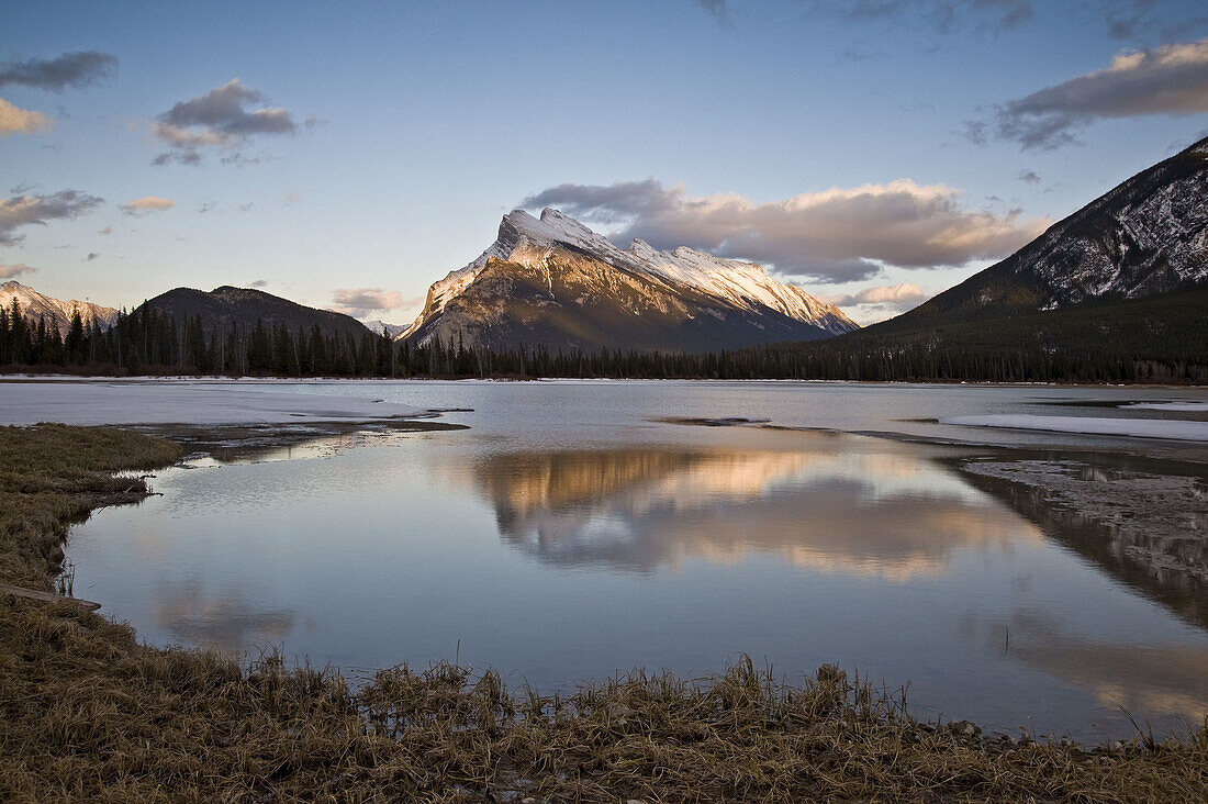 Mt Rundle reflected in Vermilion Lake in ealry spring/late winter