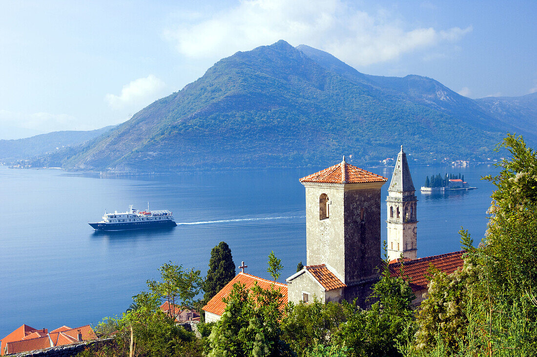 Church steeples and Lake Kotor with the village of Perast, Montenegro and its island churches