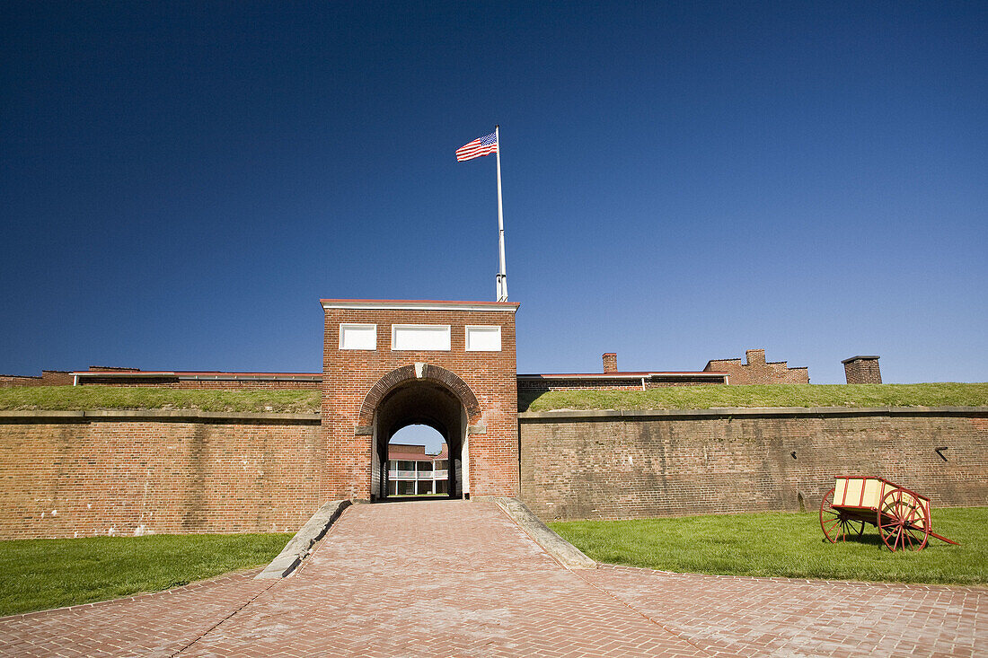 USA, MD, Baltimore. The arched entrance into the fortified walls of Fort McHenry is the only way in and out.