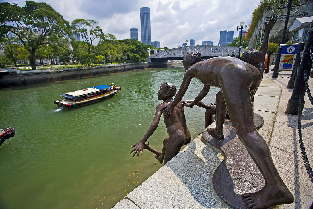 The First Generation statue on the Singapore River, close to the Cavanagh Bridge