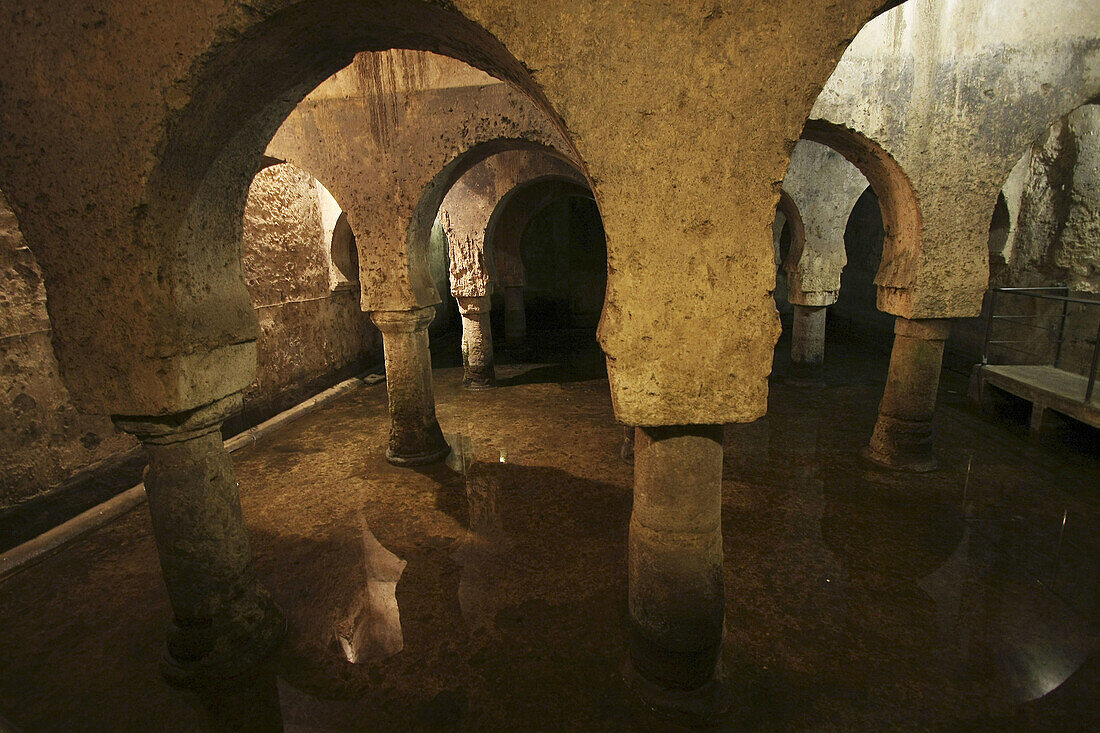 Moorish aljibe (water cistern) in the cellar of the Palacio de las Veletas, Caceres. Extremadura, Spain