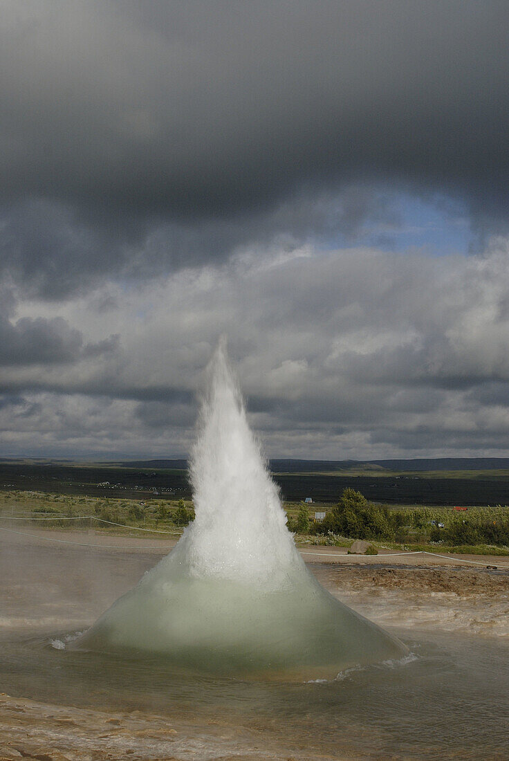 Strokkur geyser eruption in the geothermic region of Geysir, Iceland