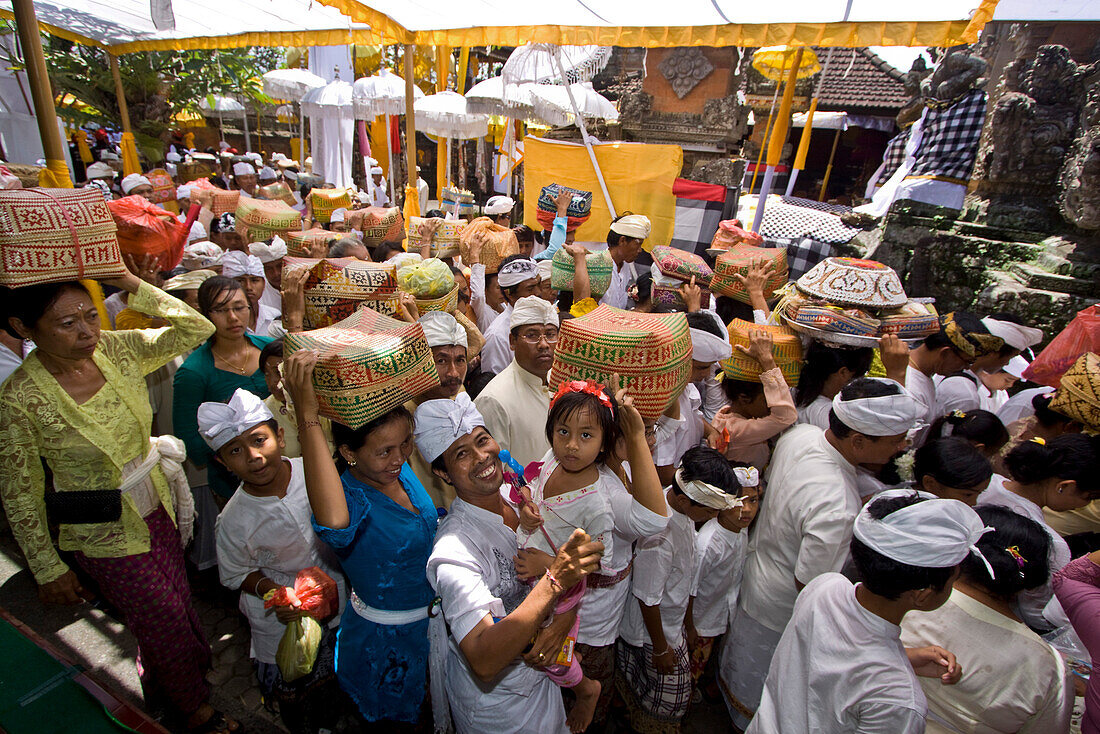 Hindus bringing offerings to Temple in Mas during Koningan Ceremoy  , Bali Indonesia