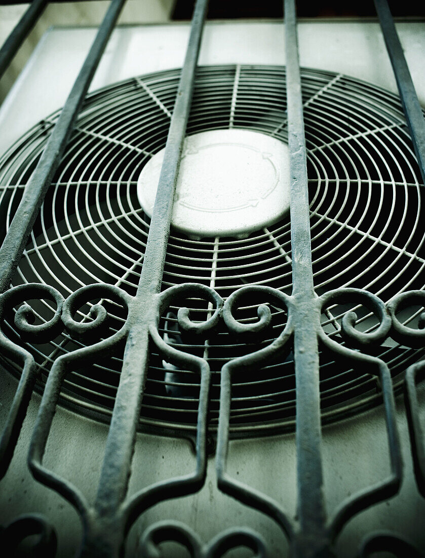 Air-conditioner, Air-conditioning, bar, bars, Close up, Close-up, Closeup, Color, Colour, Concept, Concepts, Cooling fan, Cooling fans, Daytime, detail, details, Equipment, exterior, Fan, Fans, Gear, Industrial, Industry, Metal, outdoor, outdoors, outside