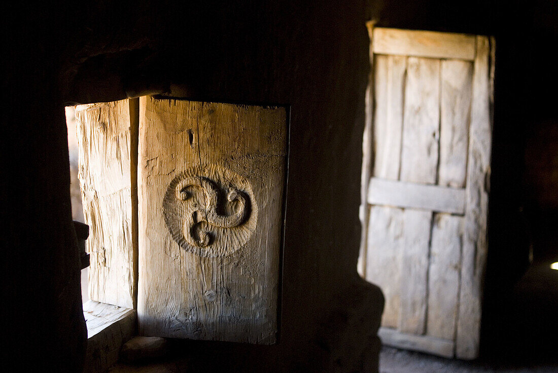 Celtic triskelion Trisquel in a house replica in Numancia (Numantia) archaeological site. Near Garray, Soria province, Castile-Leon, Spain