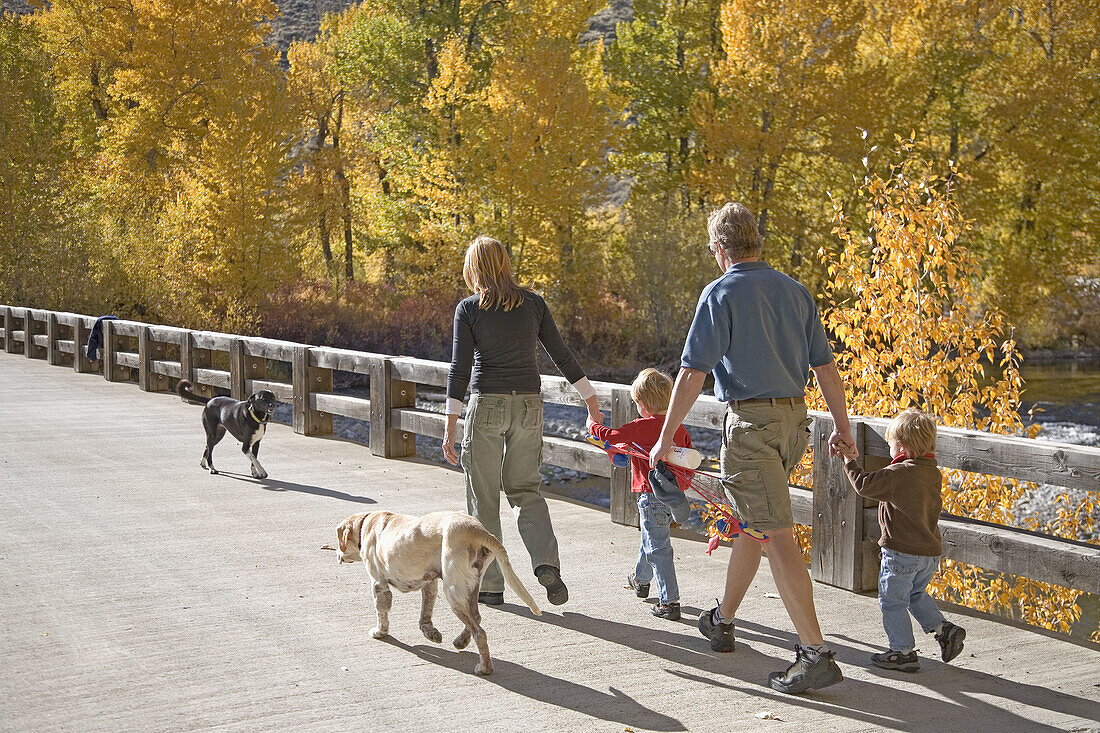 Family walking, Sun Valley, Idaho, USA